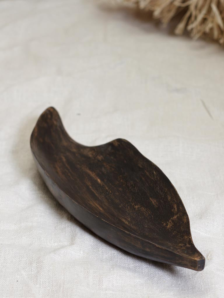 Dark wooden tray leave